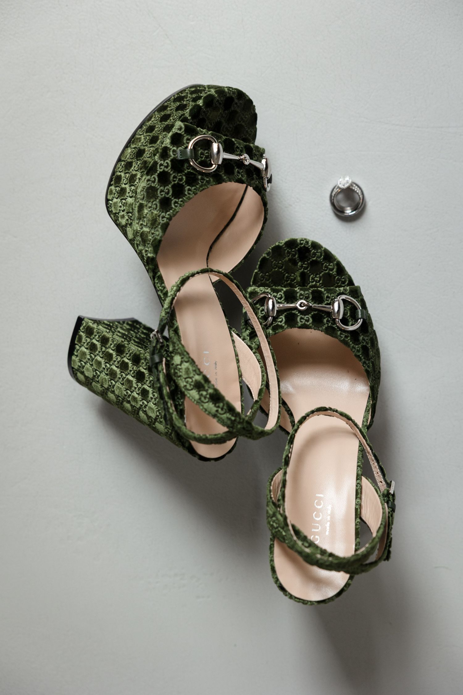 Green snakeskin Gucci block heel sandals at Le Méridien Tampa, Florida, captured by Grand Photo by Karyna Oliinyk