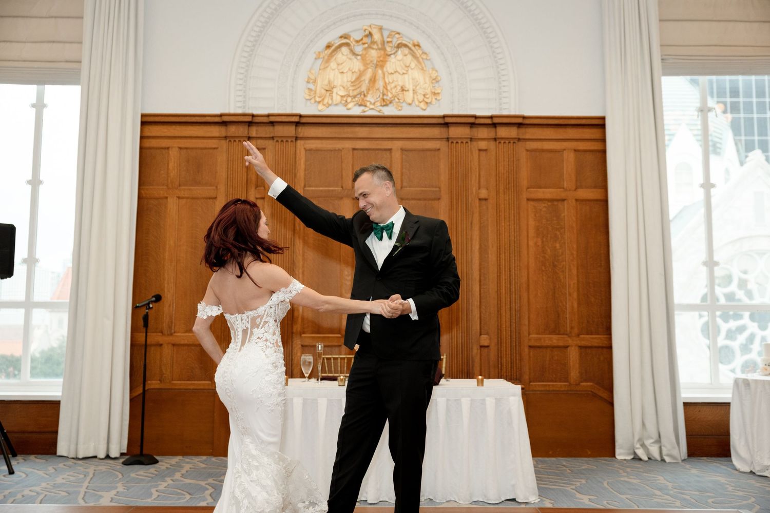 Bride and groom share their first dance in an elegant ballroom at Le Méridien Tampa, Florida, captured by Grand Photo by Karyna Oliinyk
