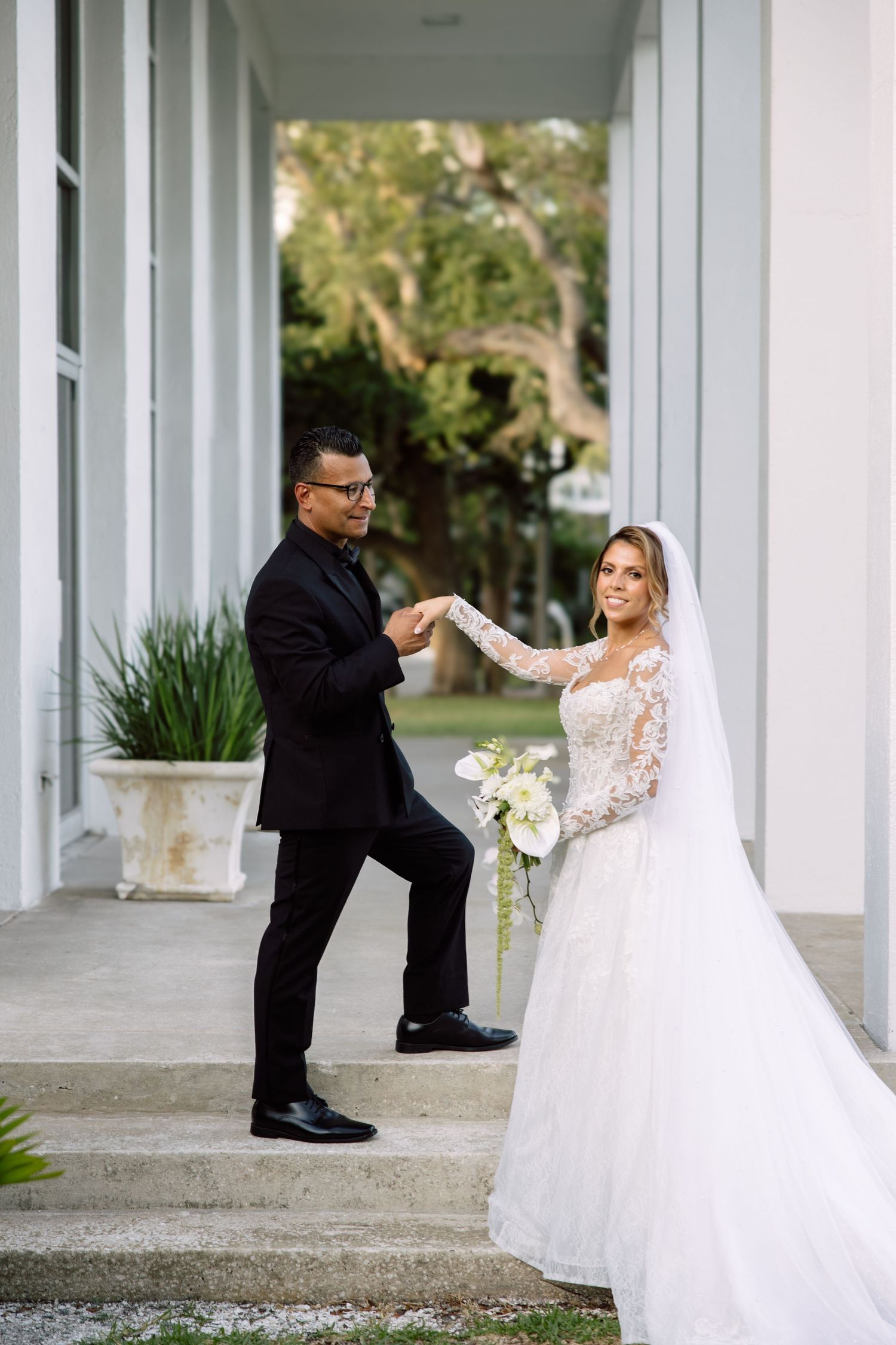 Wedding Portraits of bride and groom at Tampa Garden Club, Florida, captured by Grand Photo by Karyna Oliinyk