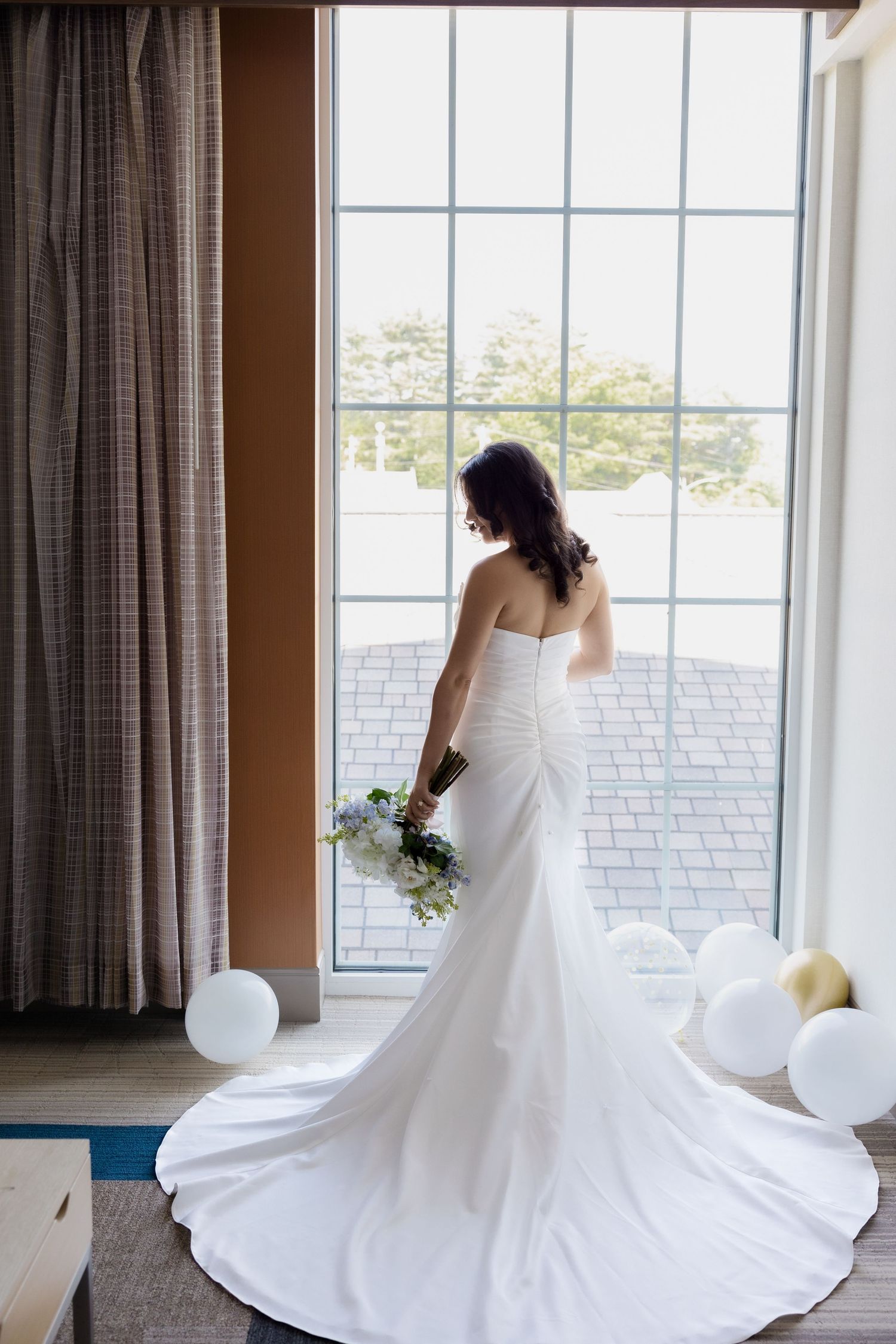 Bride getting ready at Opal Sands Resort in Clearwater Beach, Florida, captured by Grand Photo by Karyna Oliinyk