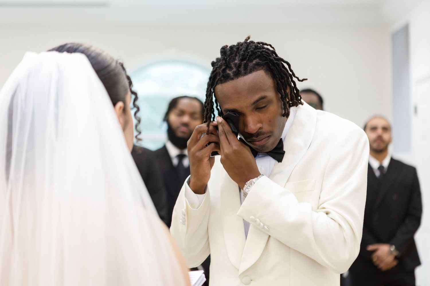 Crying groom during the wedding ceremony at Harborside Chapel in Safety Harbor, Florida — wedding photographer Grand Photo, Karyna Oliinyk