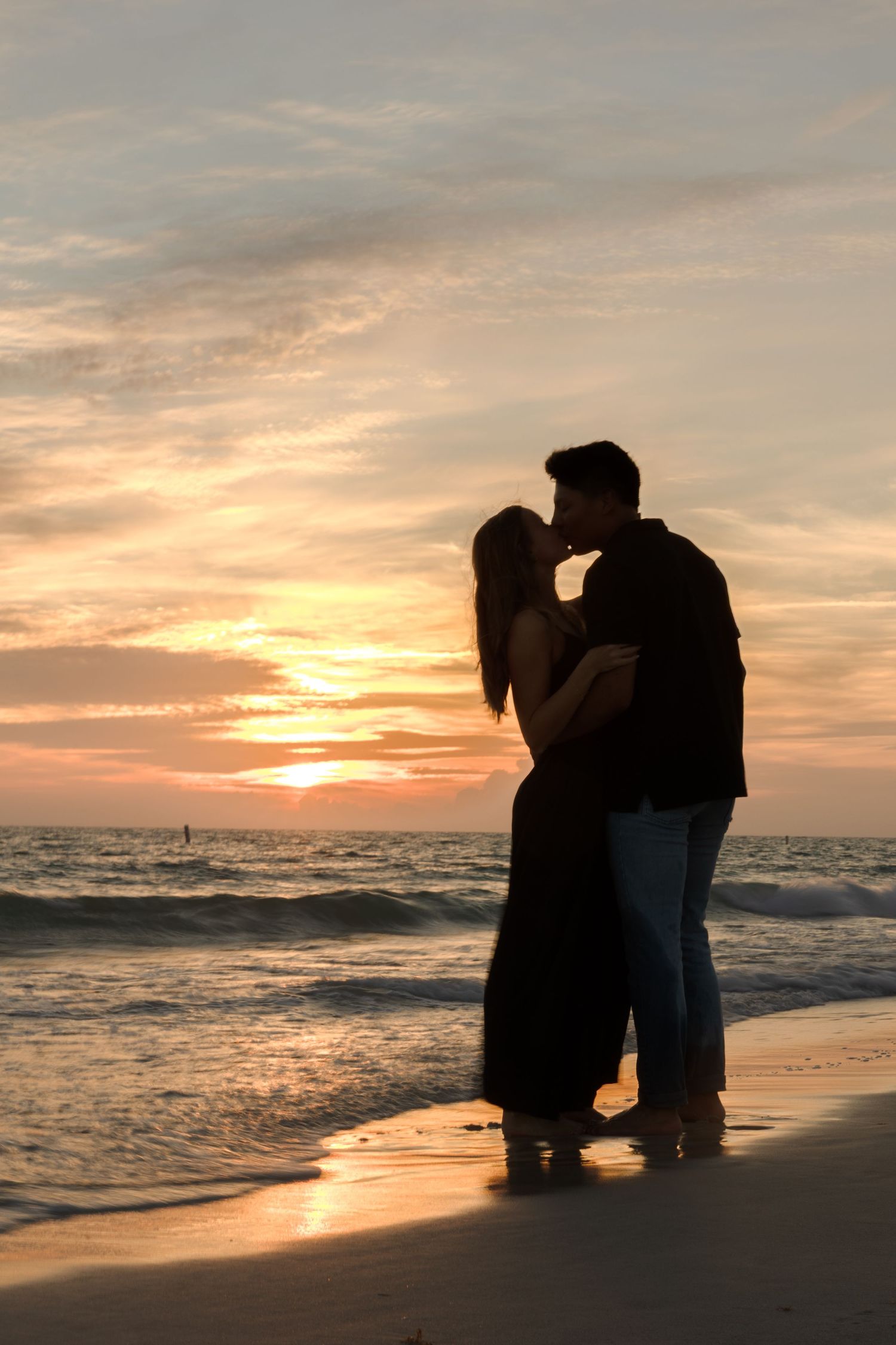Beach sunset engagement couple session at Treasure Island Florida, captured by Grand Photo Karyna Oliinyk