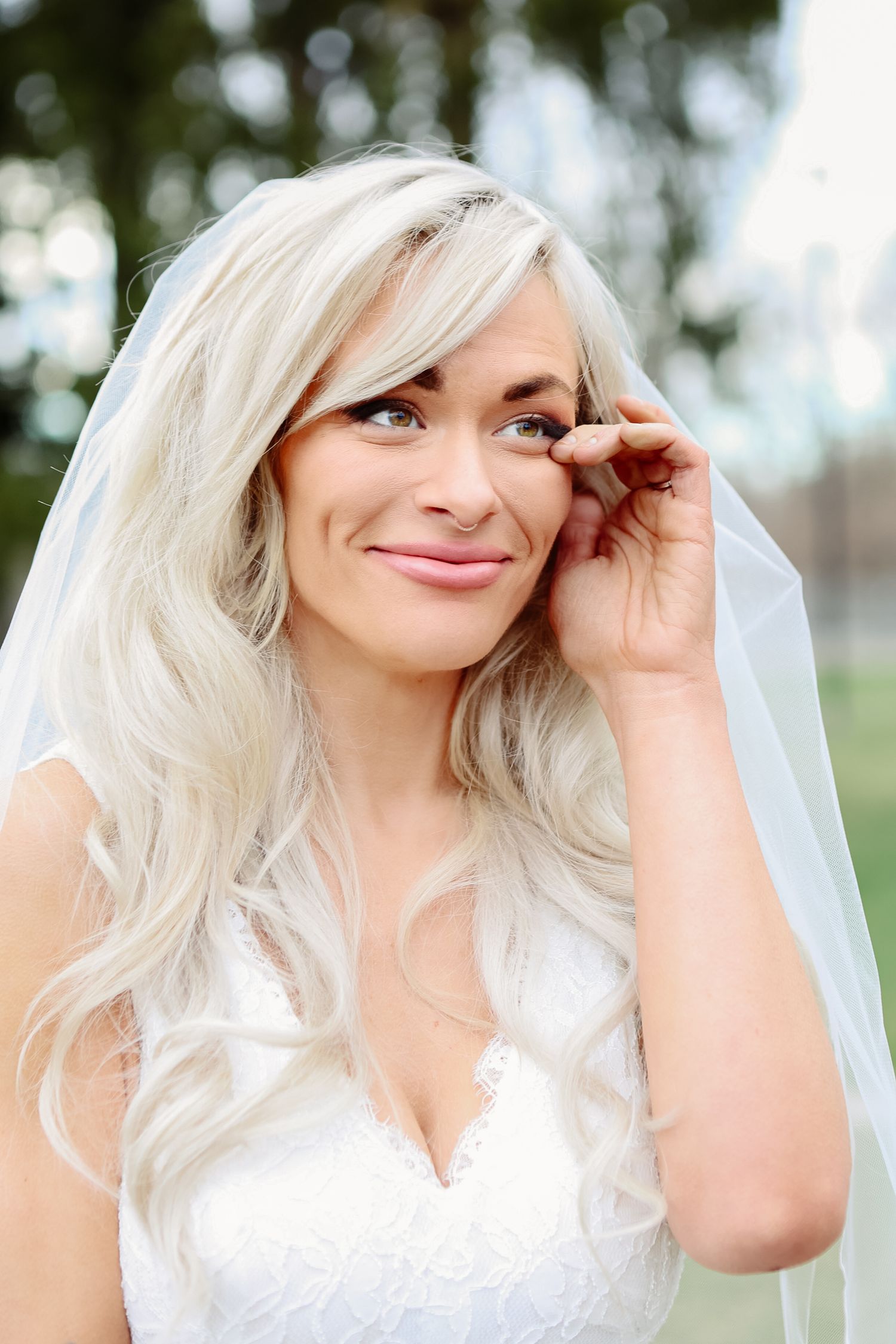 Emotional bride during ceremony at Marie Selby Botanical Gardens in Sarasota, Florida, captured by Grand Photo by Karyna Oliinyk