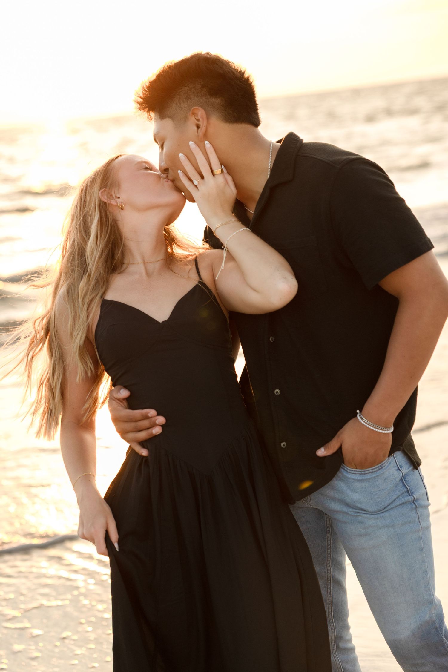 Beach sunset engagement couple session at Treasure Island Florida, captured by Grand Photo Karyna Oliinyk
