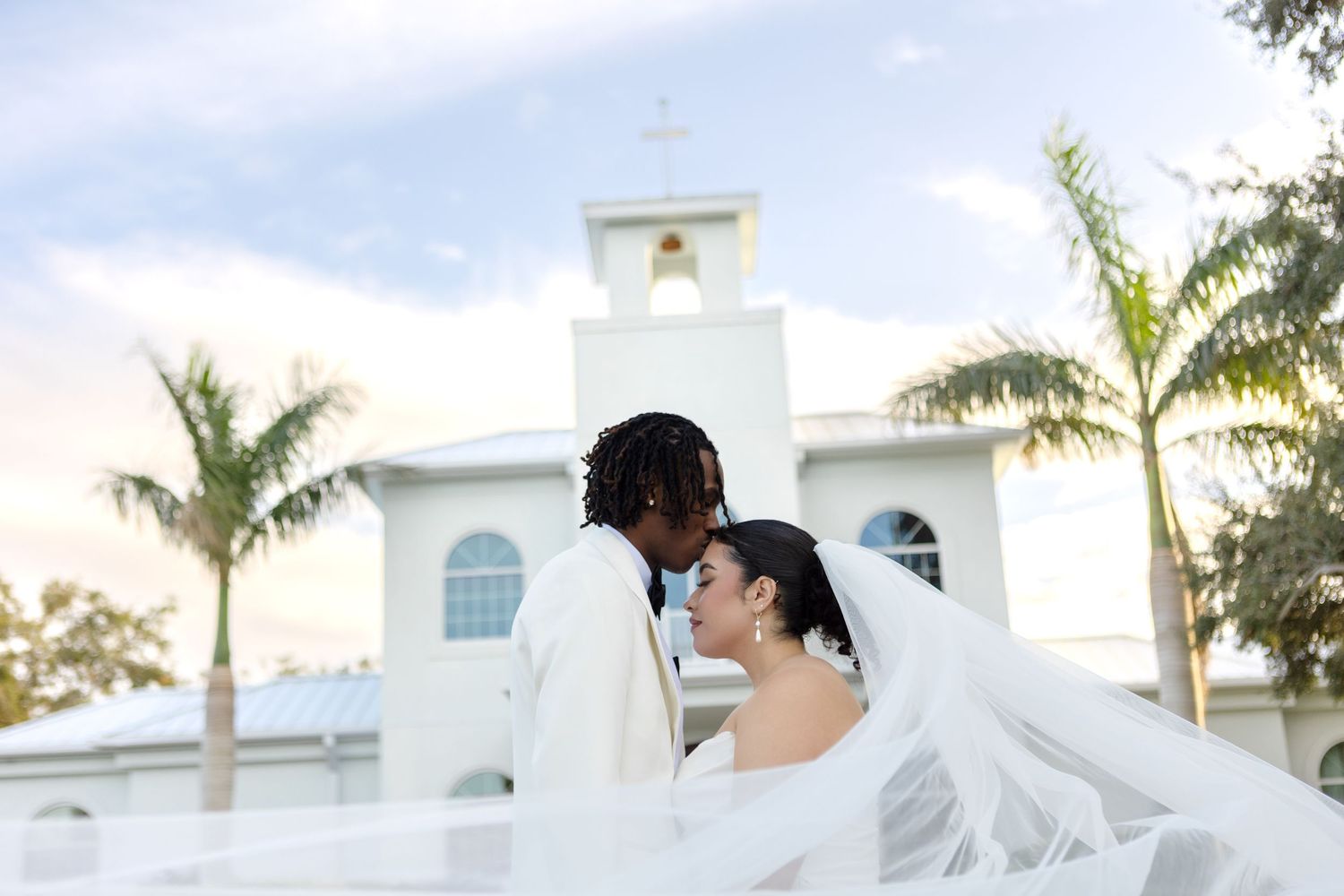 International bride and groom portraits at Harborside Chapel in Safety Harbor, Florida — wedding photographer Grand Photo, Karyna Oliinyk