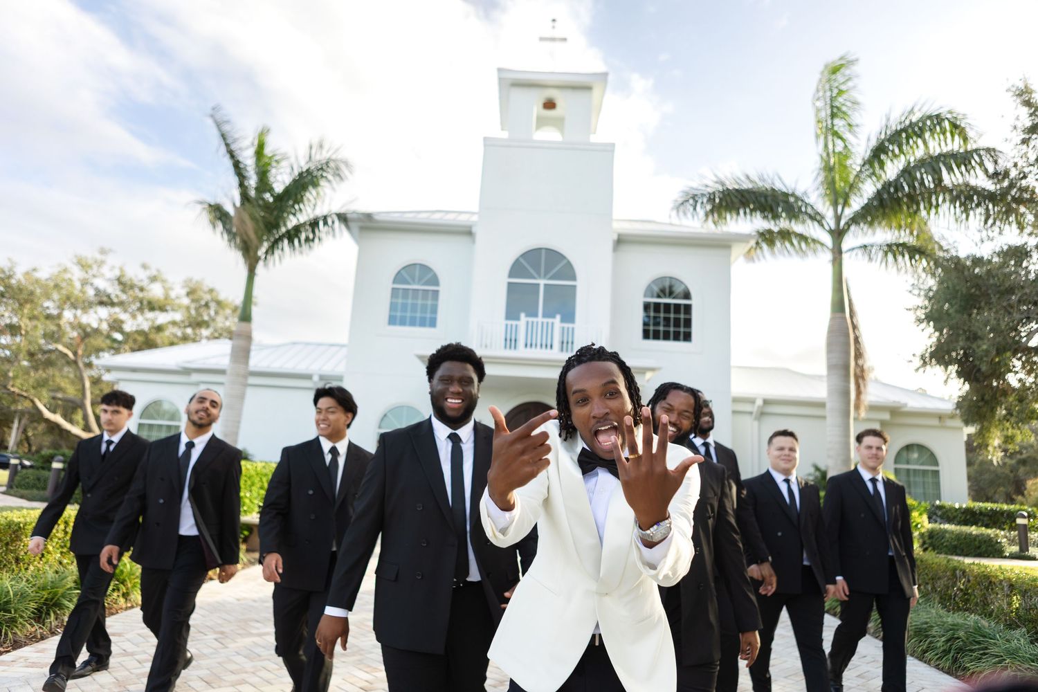 Groom and groomsmen outside Harborside Chapel in Safety Harbor, Florida — wedding photographer Grand Photo, Karyna Oliinyk