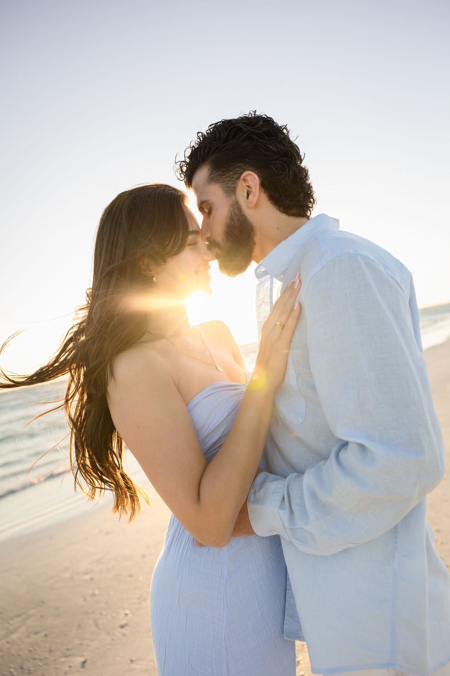 Sunset engagement photography session in Lido Beach Sarasota Florida, captured by Grand Photo, Karyna Oliinyk