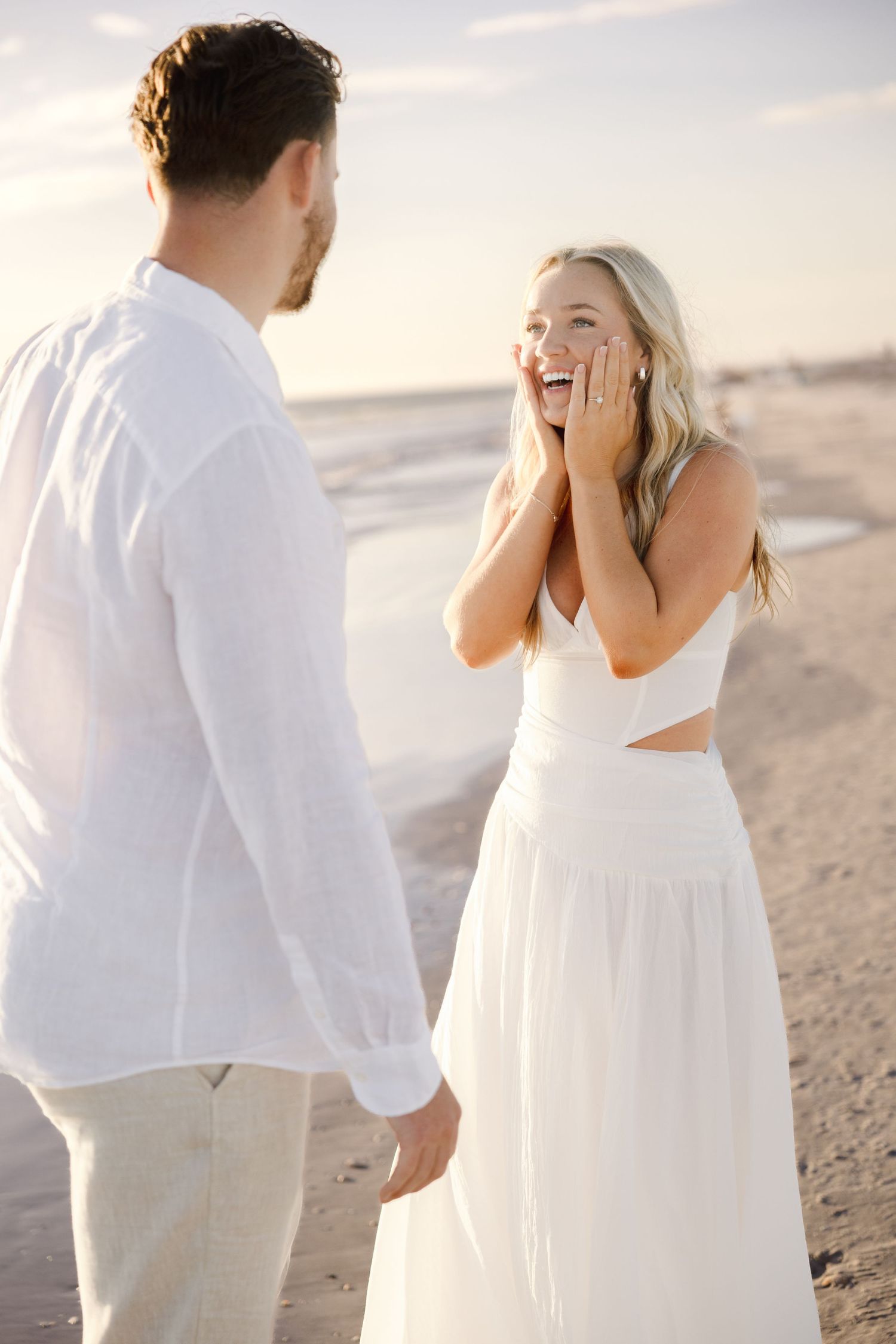 Sunset surprise beach proposal session at St. Pete Beach Florida, captured by Grand Photo Karyna Oliinyk