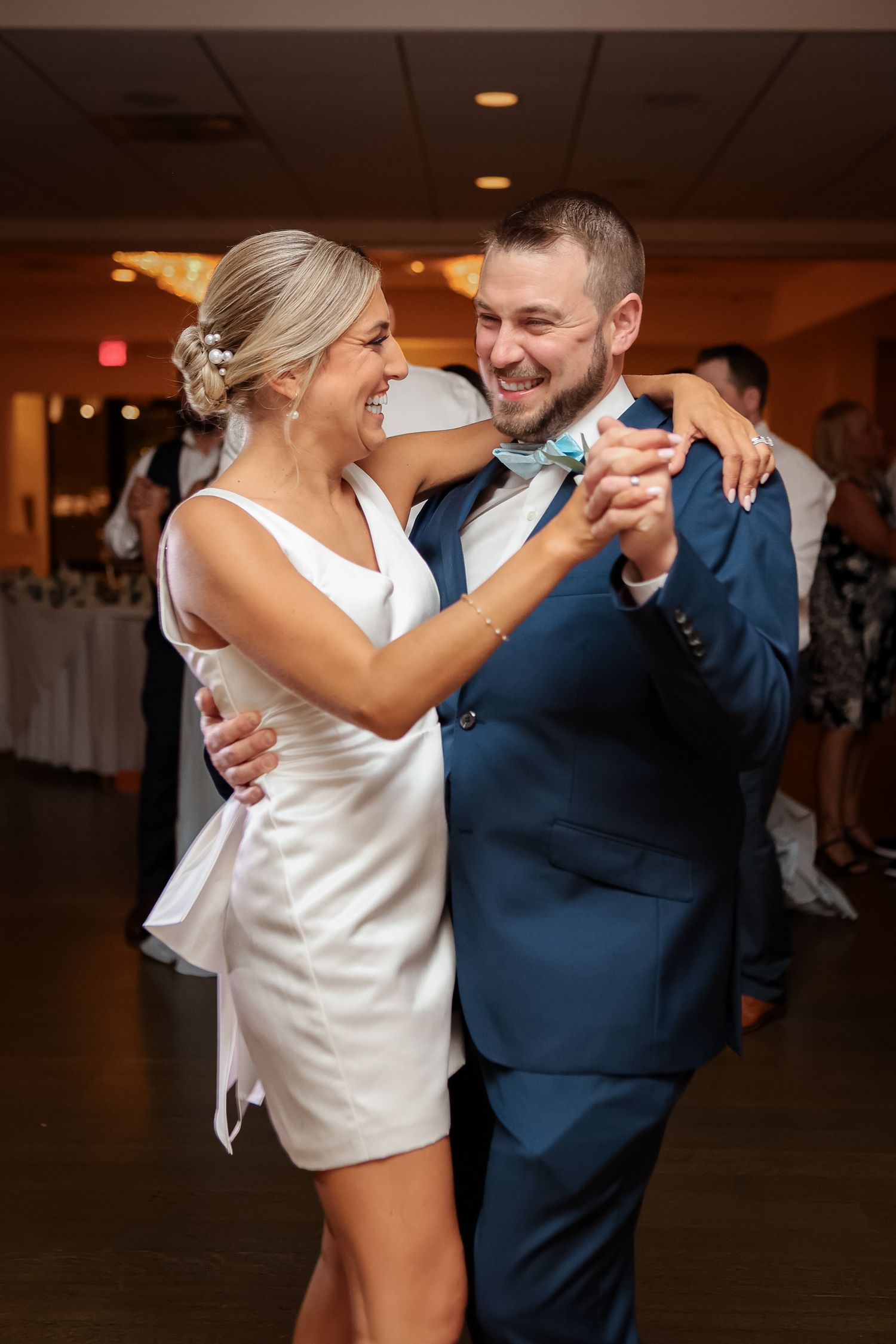 Bride and groom first dance at Danversport in Danvers, Massachusetts, captured by Grand Photo by Karyna Oliinyk