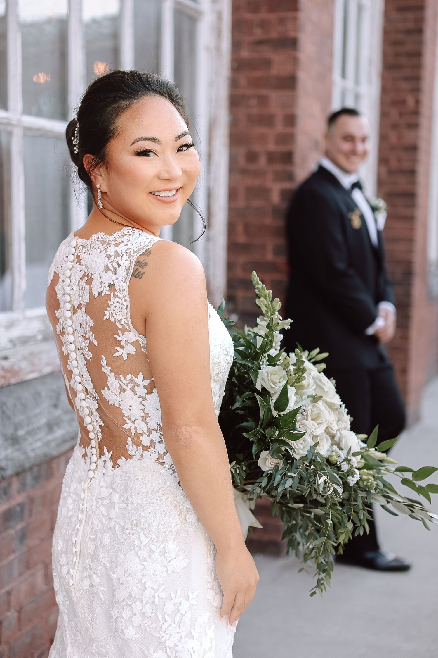 First look with groom before ceremony in Seaport district at Boston in Boston, Massachusetts, captured by Grand Photo by Karyna Oliinyk