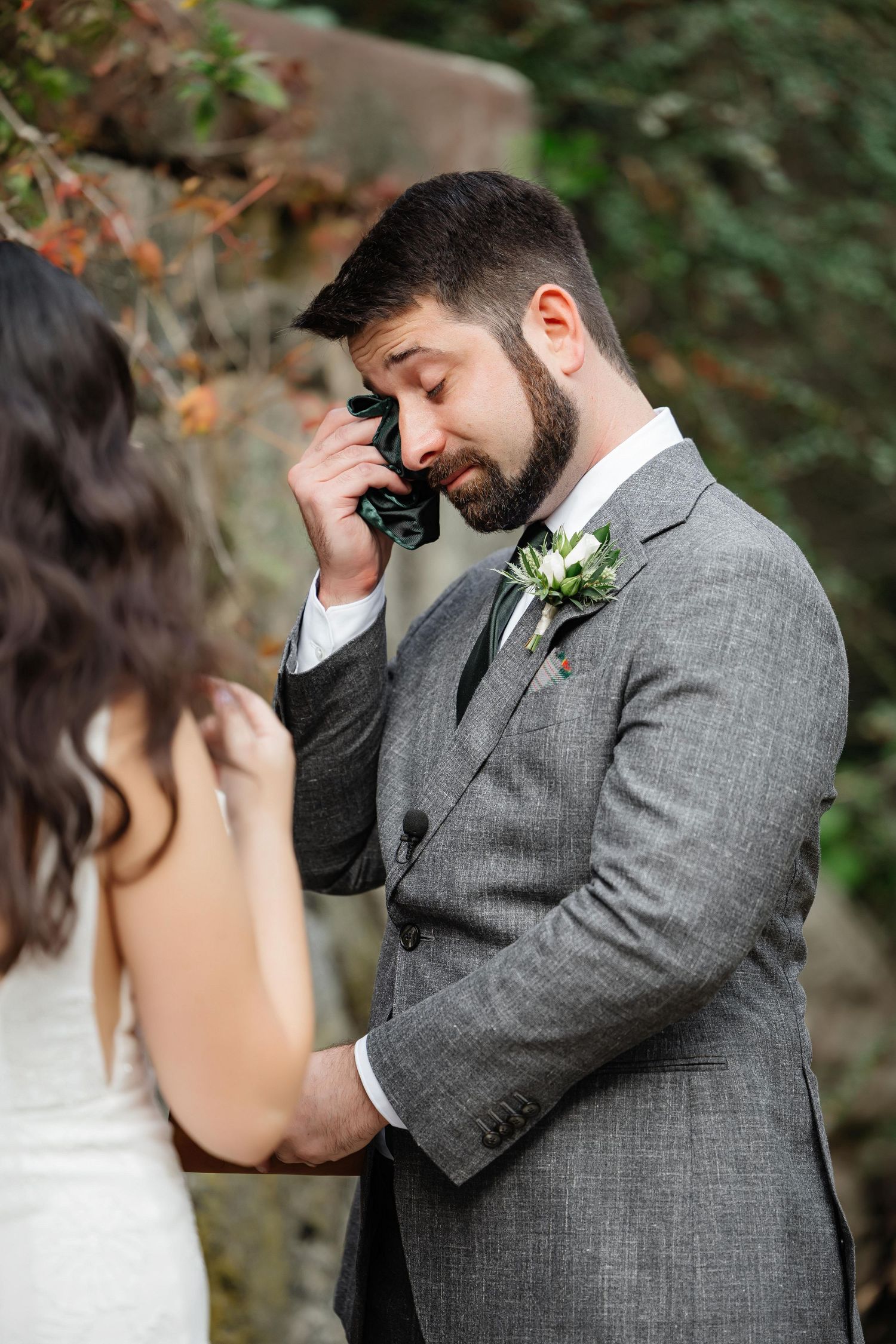 The groom tears up during wedding ceremony at Opal Sands Resort in Clearwater, Florida — wedding photographer Grand Photo, Karyna Oliinyk
