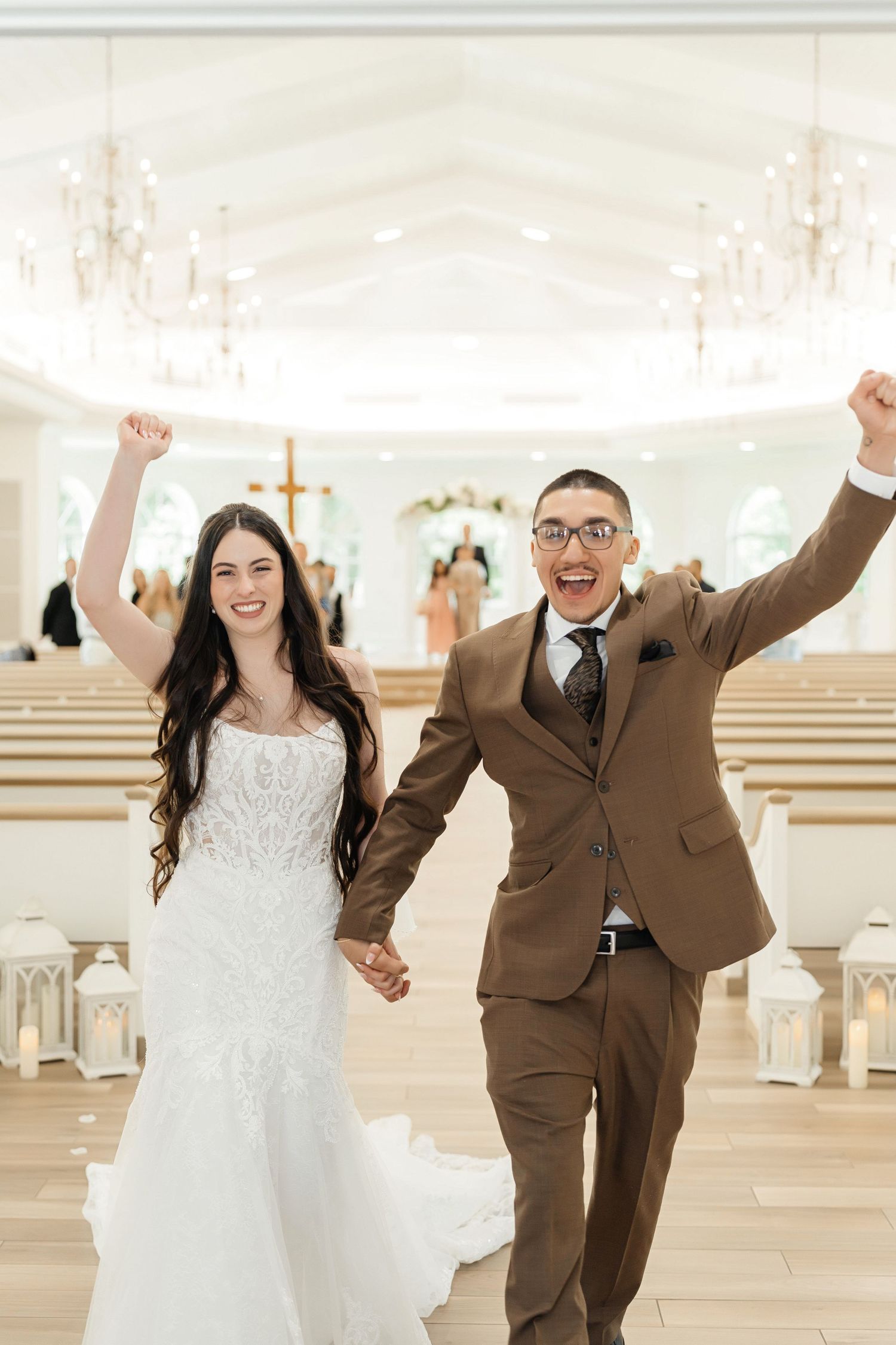 Bride and groom walking down the aisle at Harborside Chapel in Safety Harbor, Florida — wedding photographer Grand Photo, Karyna Oliinyk