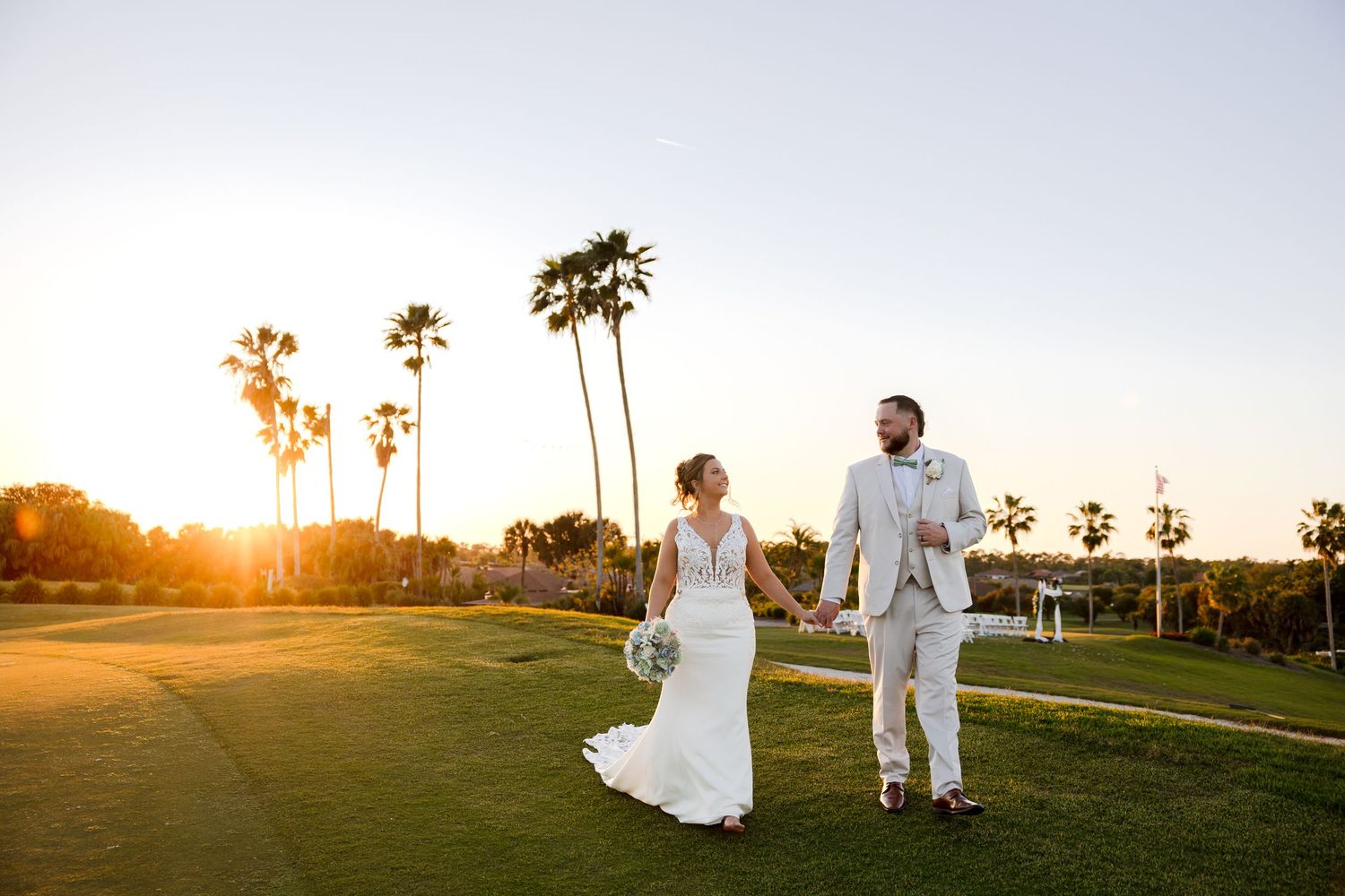 Bride and groom sunset portraits at Heron Creek Golf & Country Club in North Port, Florida, captured by Grand Photo by Karyna Oliinyk