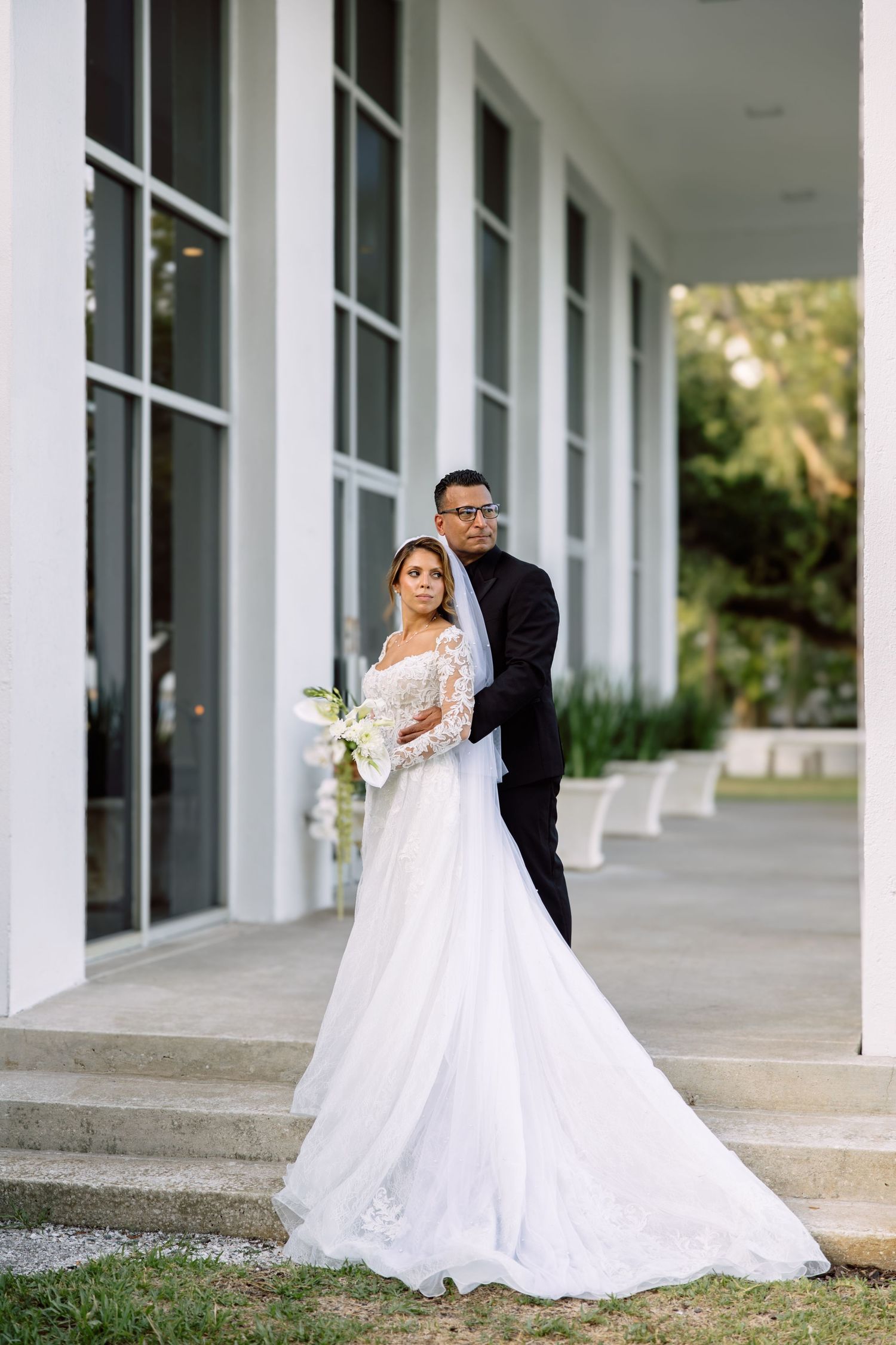 Wedding Portraits of bride and groom at Tampa Garden Club, Florida, captured by Grand Photo by Karyna Oliinyk