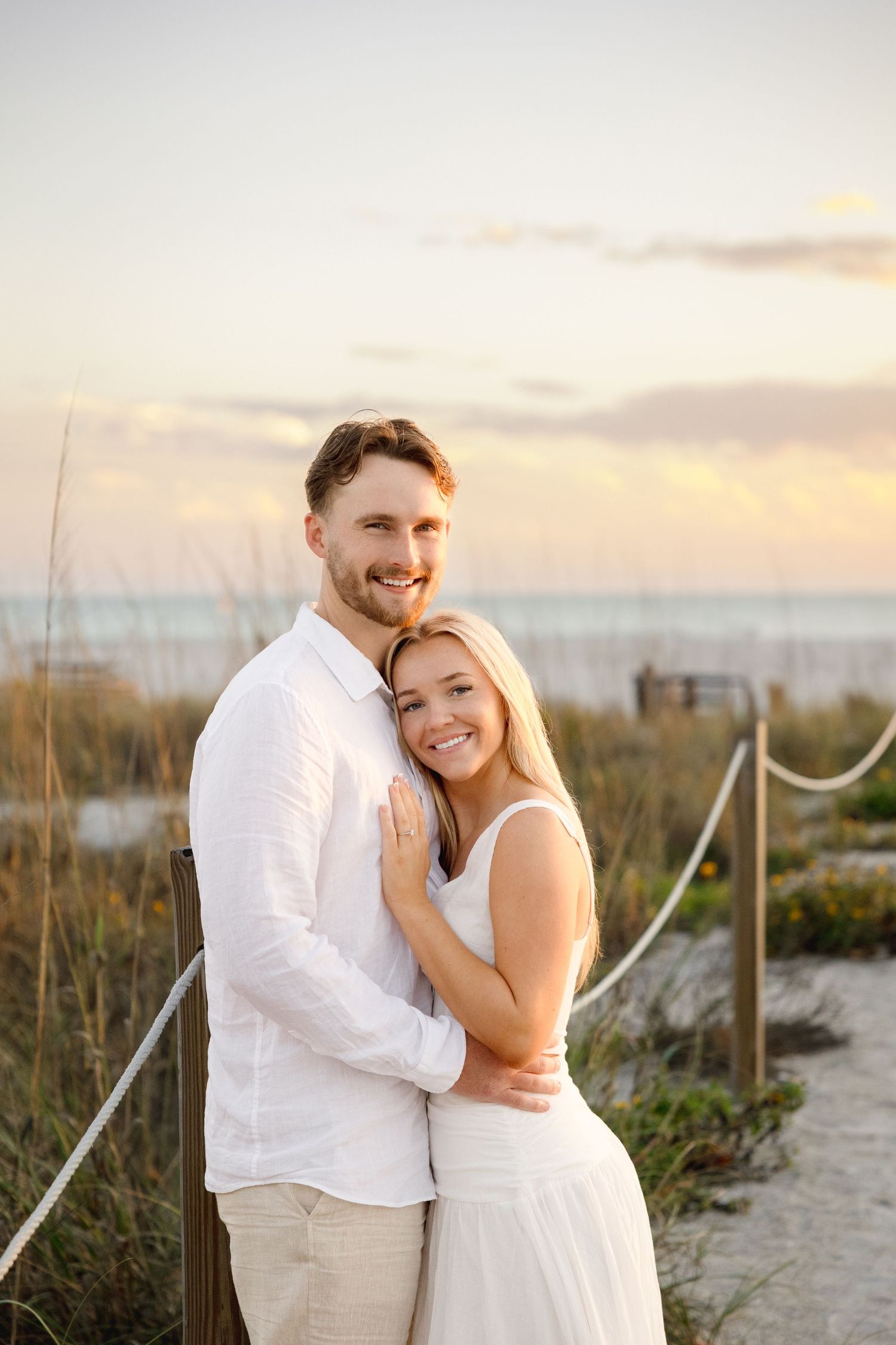 Beach engagement couple session at St. Pete Beach Florida, captured by Grand Photo Karyna Oliinyk