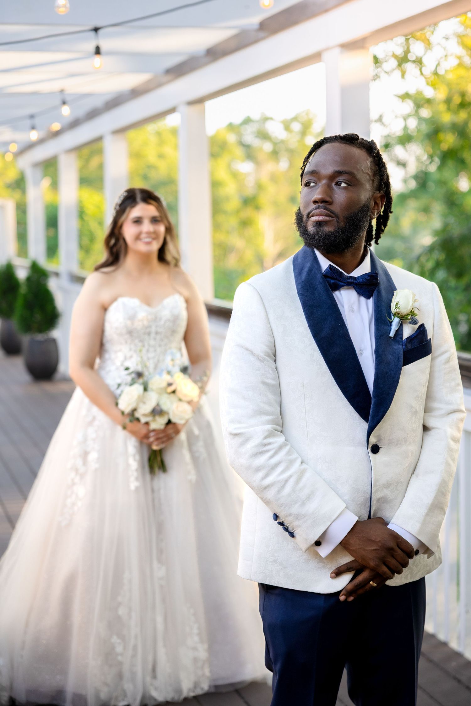 Multicultural wedding couple during first look at The River Club in Scituate, Massachusetts, captured by Grand Photo by Karyna Oliinyk