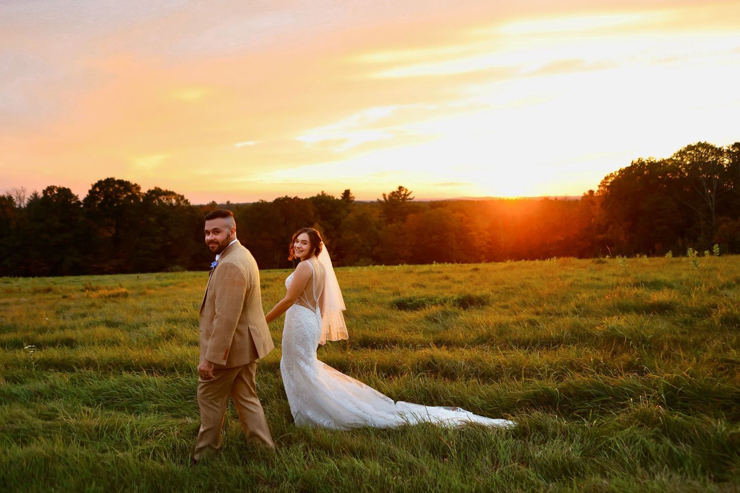 Sunset wedding photos of bride and groom at Harrington Farm in Massachusetts, captured by Grand Photo by Karyna Oliinyk