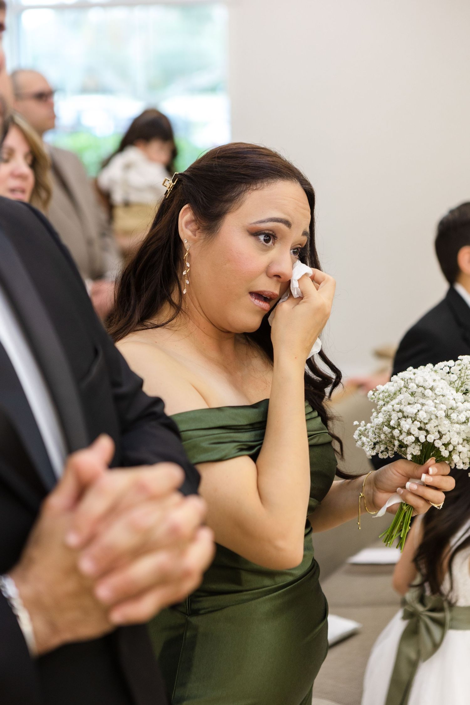 Mother crying during the wedding ceremony at Harborside Chapel in Safety Harbor, Florida — wedding photographer Grand Photo, Karyna Oliinyk