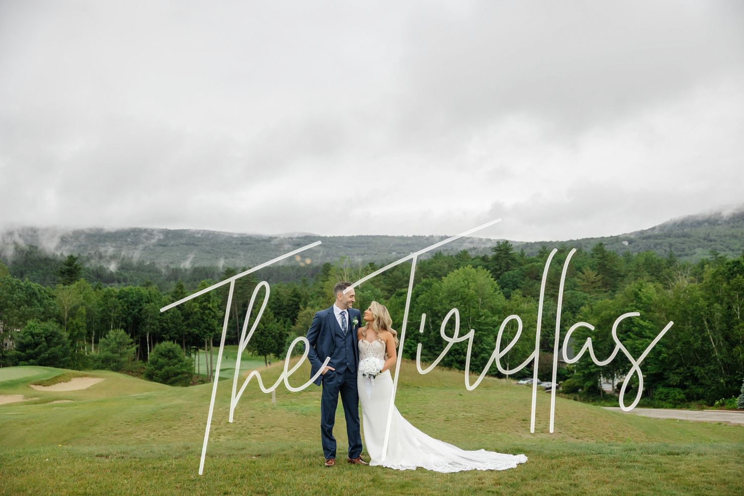 Elegant bride and groom standing together at Owl’s Nest Resort NH — Boston MA wedding photographer Grand Photo