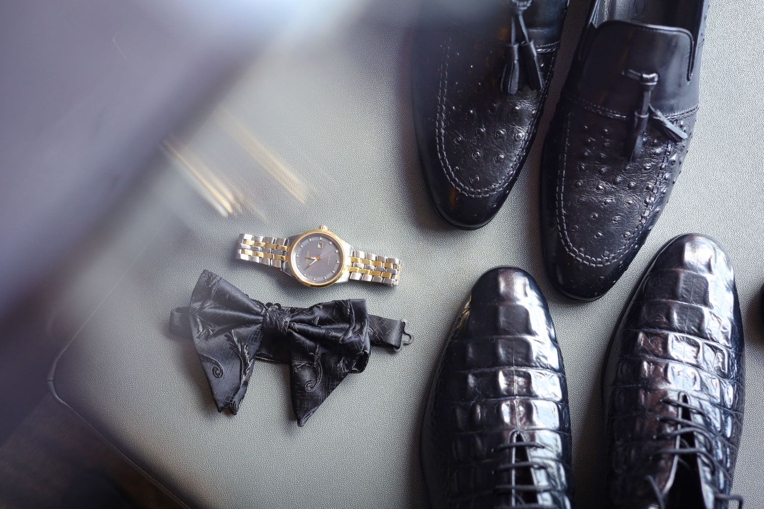 Elegant groom accessories flat lay at Opal Sands Resort in Clearwater Beach, Florida, captured by Grand Photo by Karyna Oliinyk