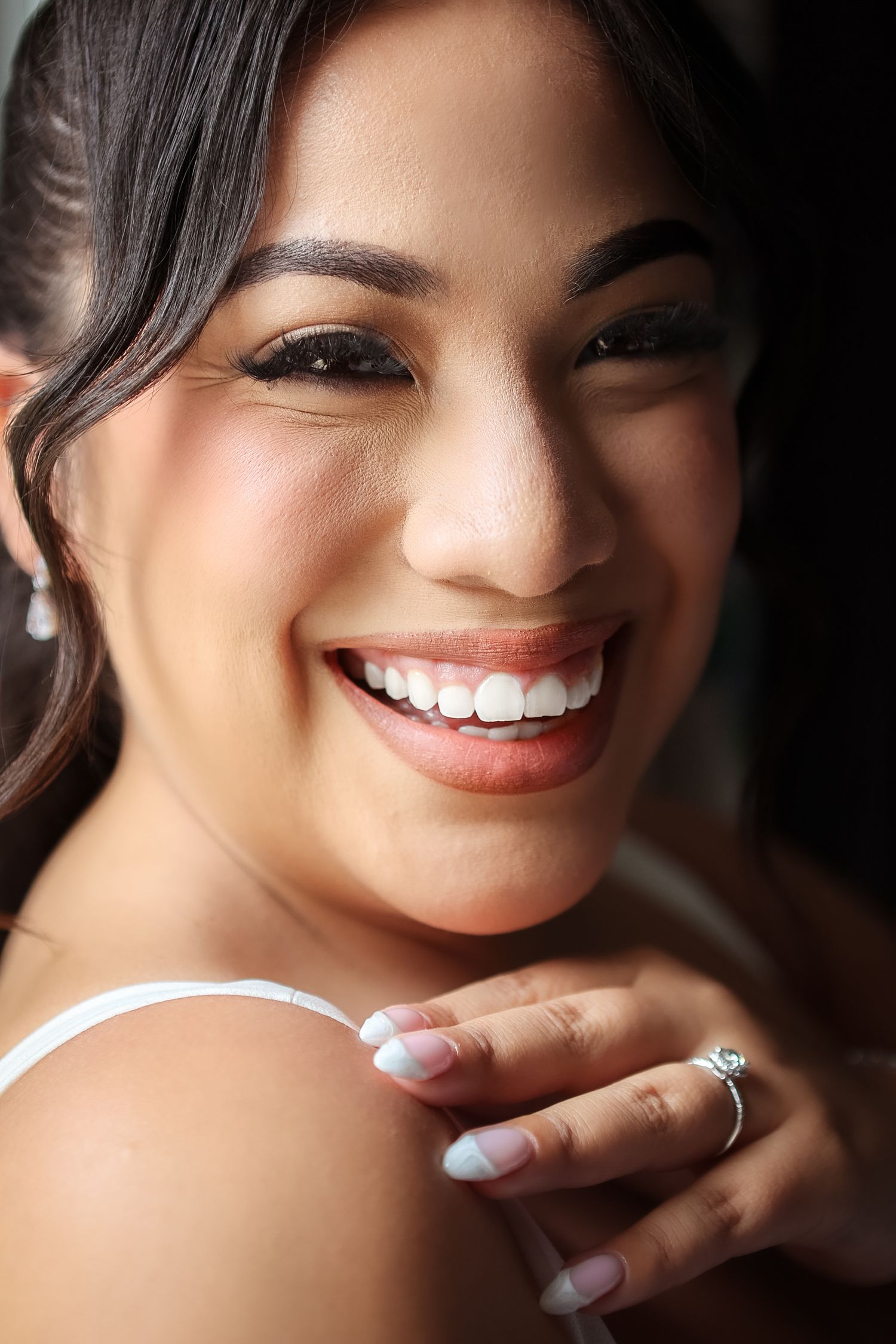 Radiant bride portrait on wedding day at The Vinoy Resort & Golf Club in St. Petersburg, Florida, captured by Grand Photo by Karyna Oliinyk