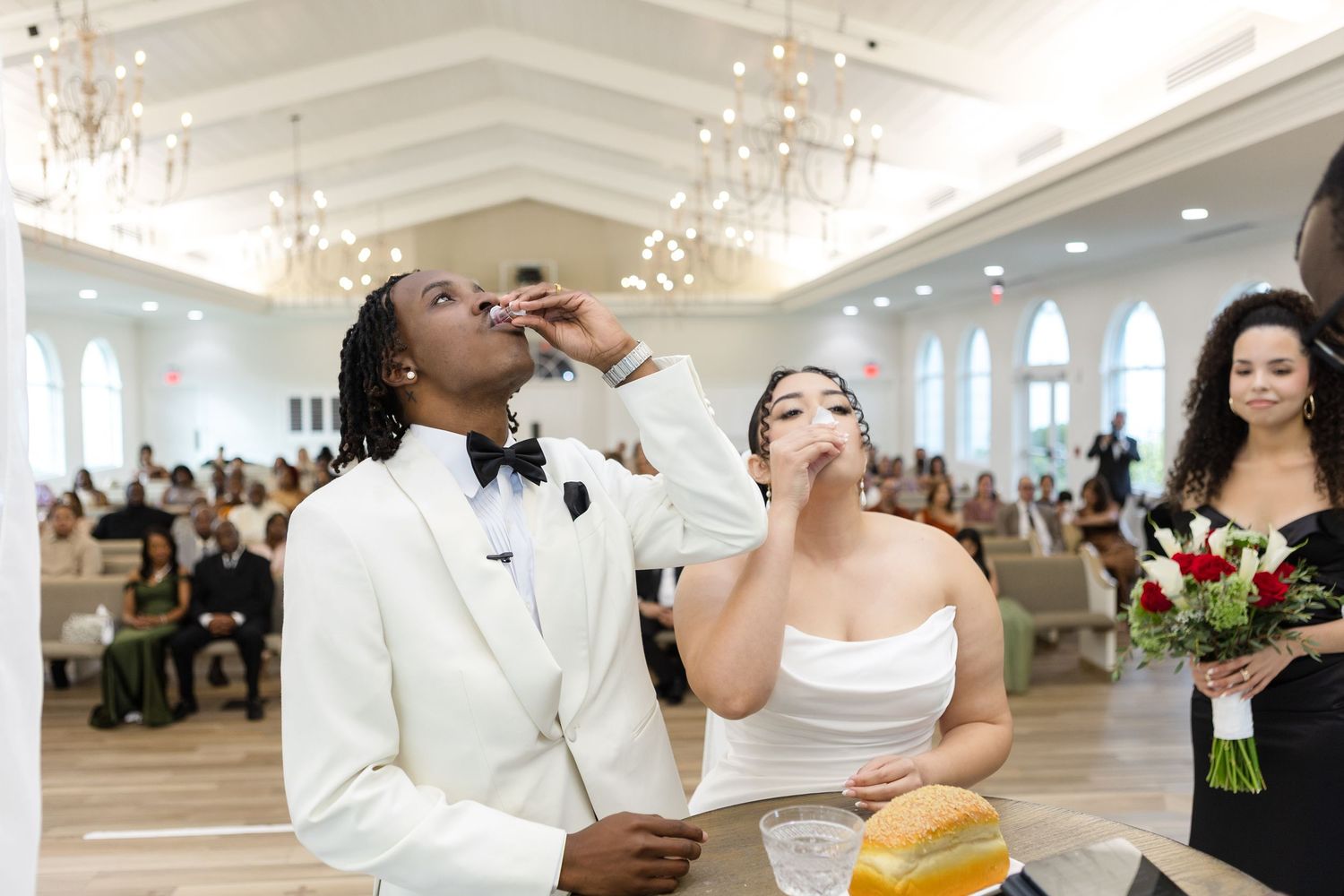 Catholic ceremony ritual during wedding at Harborside Chapel in Safety Harbor, Florida — wedding photographer Grand Photo, Karyna Oliinyk