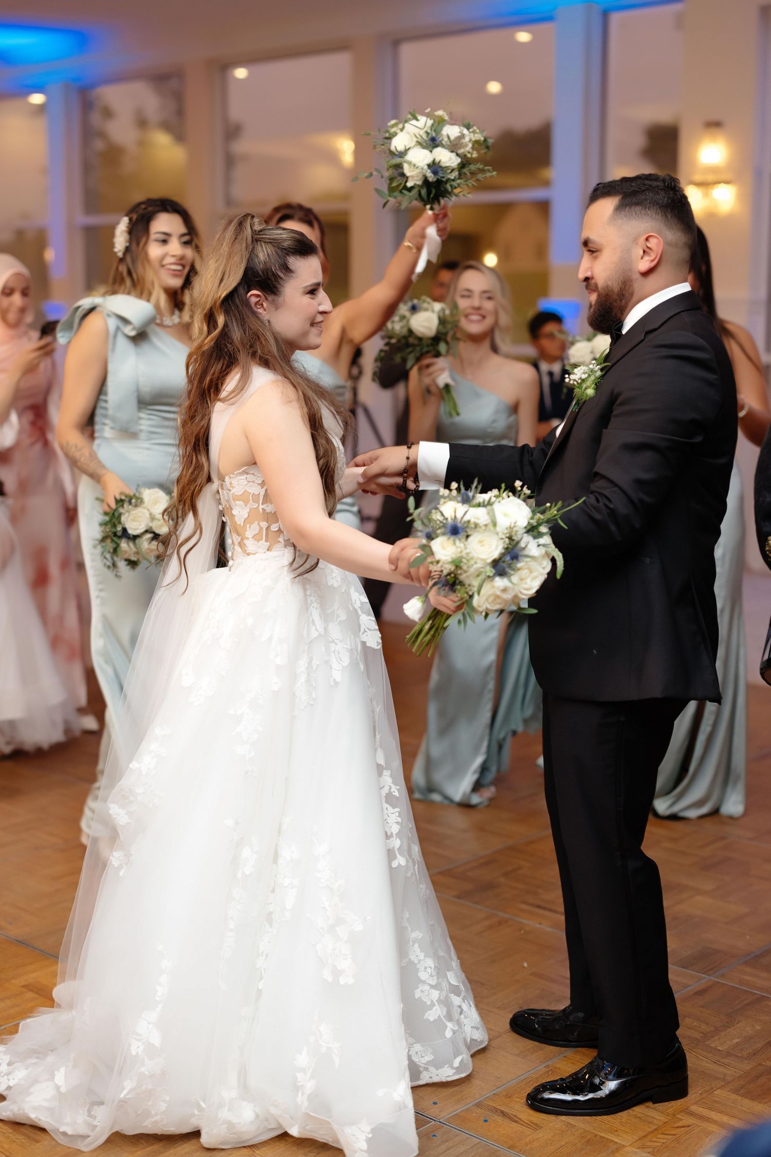 Bride and groom first dance at Indian Pond Country Club in Kingston, Massachusetts, captured by Grand Photo by Karyna Oliinyk