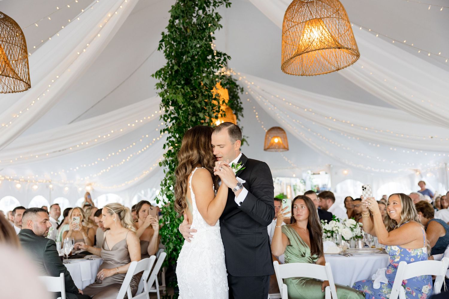 Bride and groom sharing a first dance at Sunken Gardens in St. Petersburg, Florida