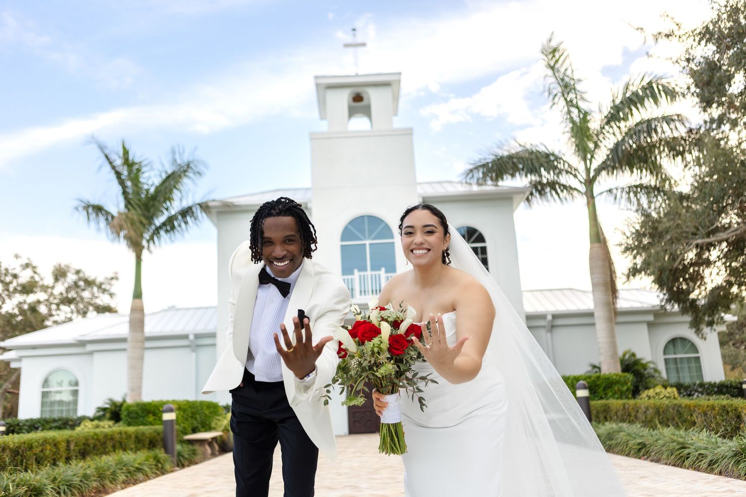 Newlyweds celebrating outside Harborside Chapel in Safety Harbor, Florida — wedding photographer Grand Photo, Karyna Oliinyk