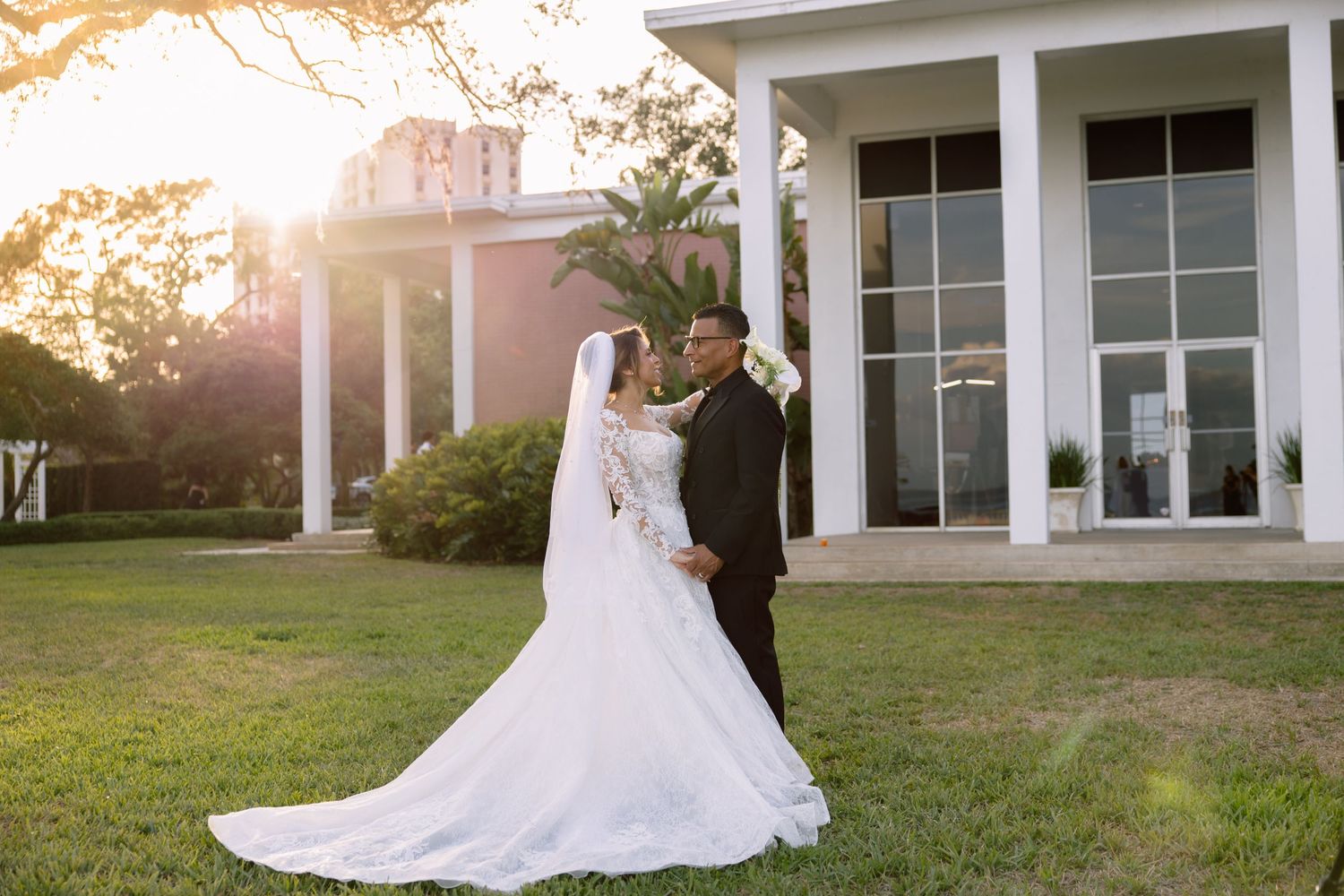 Wedding Portraits of bride and groom at Tampa Garden Club, Florida, captured by Grand Photo by Karyna Oliinyk