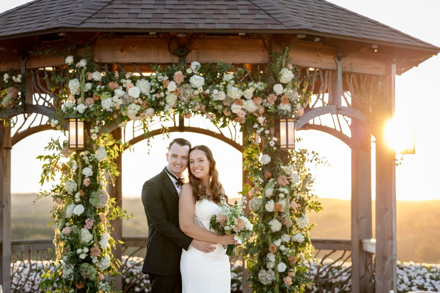 Outdoor wedding ceremony at The Starting Gate at GreatHorse —  wedding photographer Grand Photo