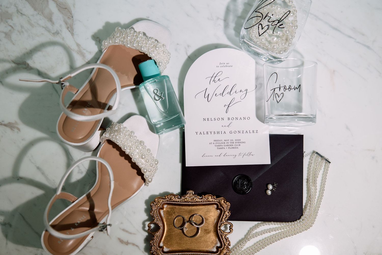 Elegant wedding flat lay at Tampa Garden Club, Florida, captured by Grand Photo by Karyna Oliinyk