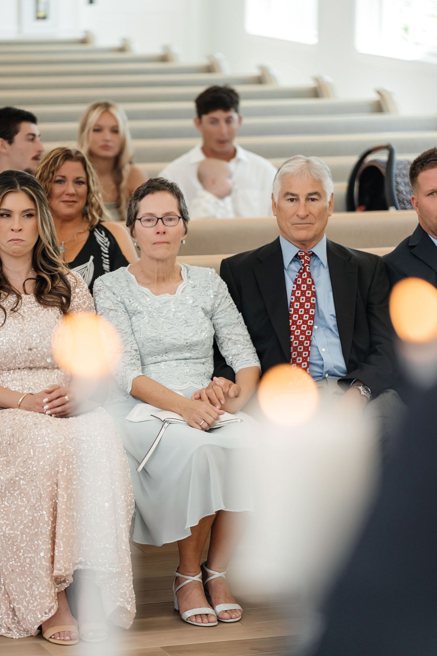 Parents during the wedding ceremony at Harborside Chapel in Safety Harbor, Florida — wedding photographer Grand Photo, Karyna Oliinyk