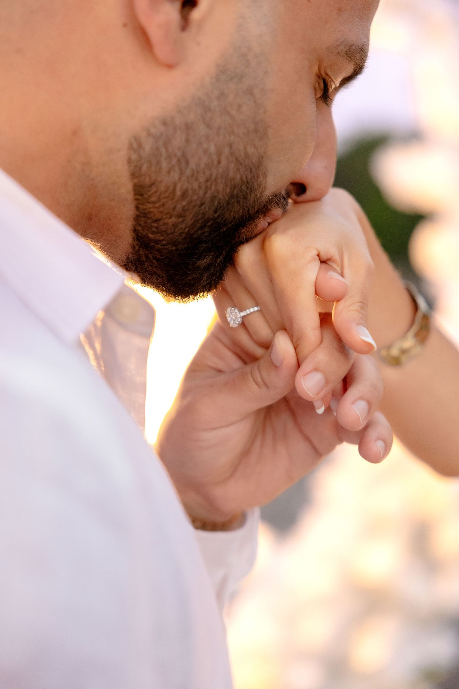 Surprise proposal session with a white heart arch in Boston Massachusetts, captured by Grand Photo, Karyna Oliinyk