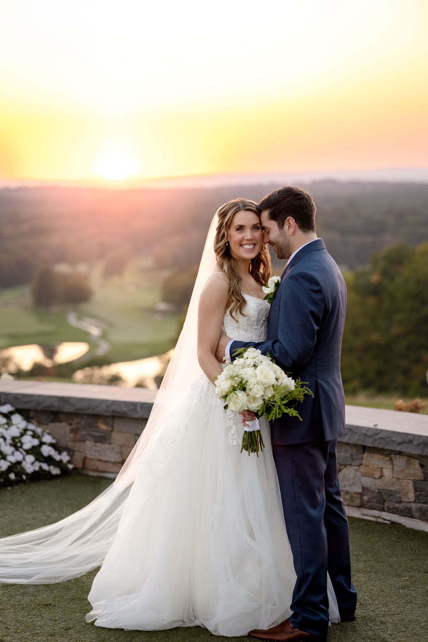 Bride and groom sharing a romantic sunset portrait at The Great Horse in Hampden, Massachusetts, captured by Grand Photo by Karyna Oliinyk