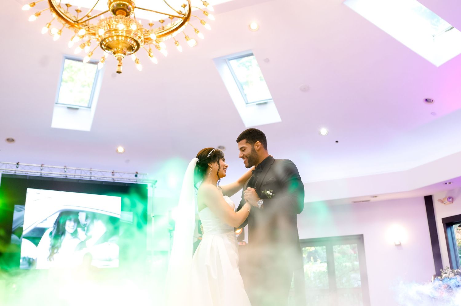 Newlyweds share romantic first dance in smoke at Granite Rose by Wedgewood Weddings Hampstead NH, wedding photographer Grand Photo
