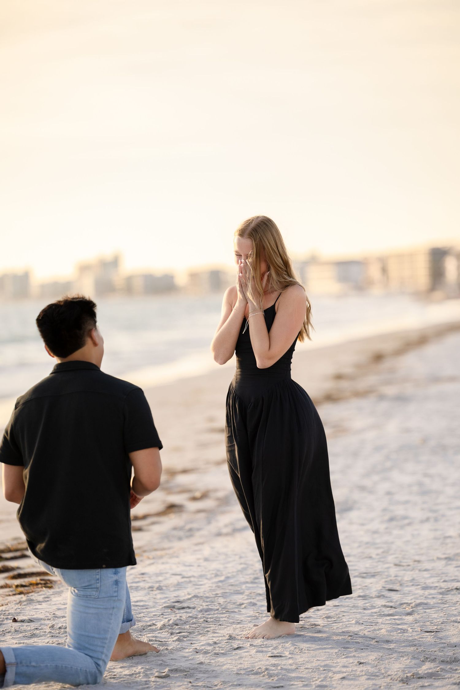 Beach sunset surprise proposal session at Treasure Island Florida, captured by Grand Photo Karyna Oliinyk
