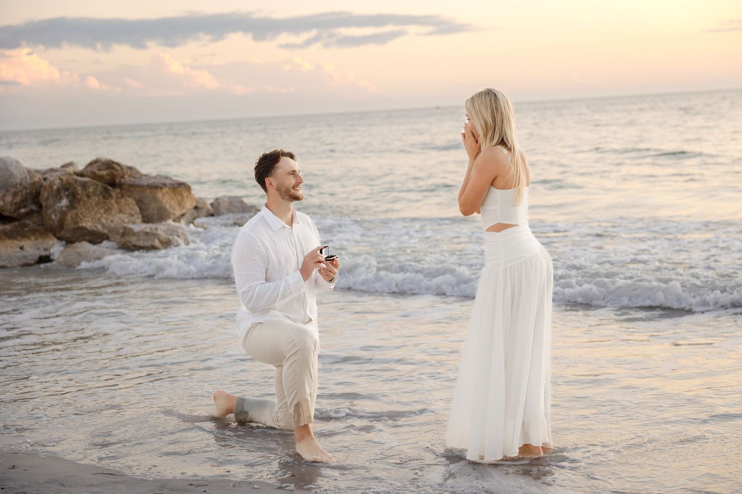 Beach surprise proposal session at St. Pete Beach Florida, captured by Grand Photo Karyna Oliinyk
