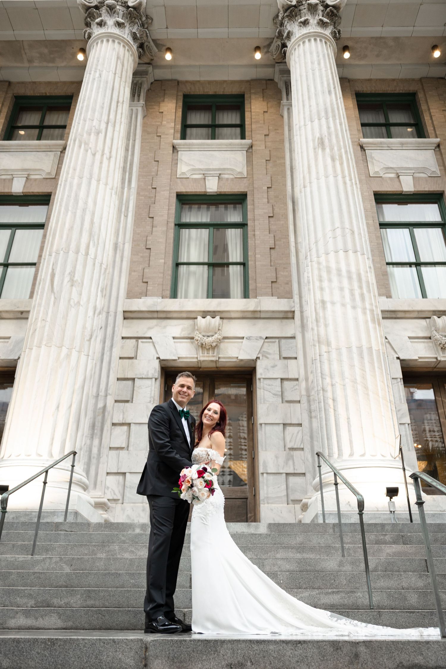 Wedding couple in front of Le Méridien Tampa, Florida, captured by Grand Photo by Karyna Oliinyk