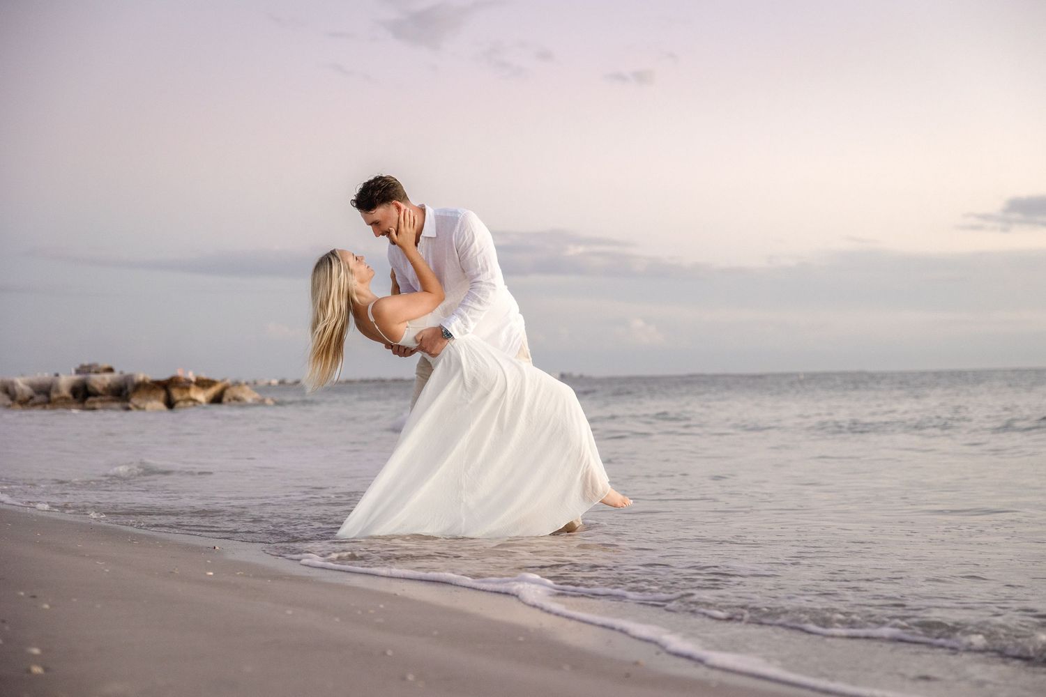 Beach engagement couple session at St. Pete Beach Florida, captured by Grand Photo Karyna Oliinyk