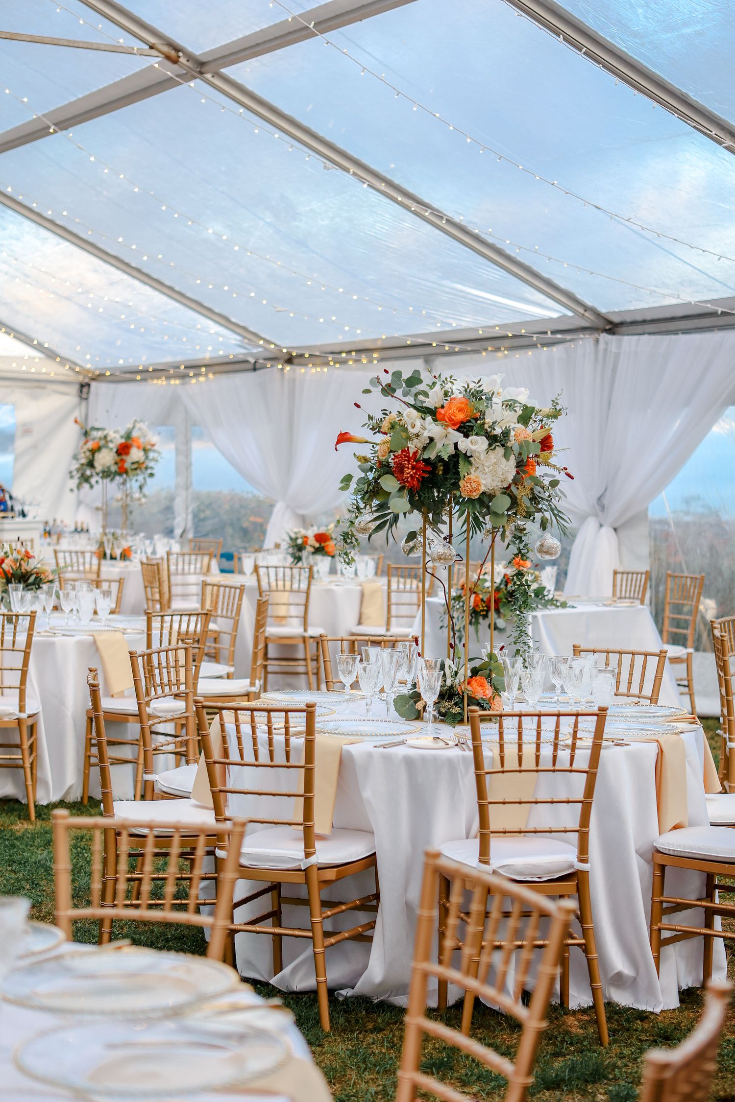 Elegant wedding reception tent in Sarasota, captured by Grand Photo by Karyna Oliinyk