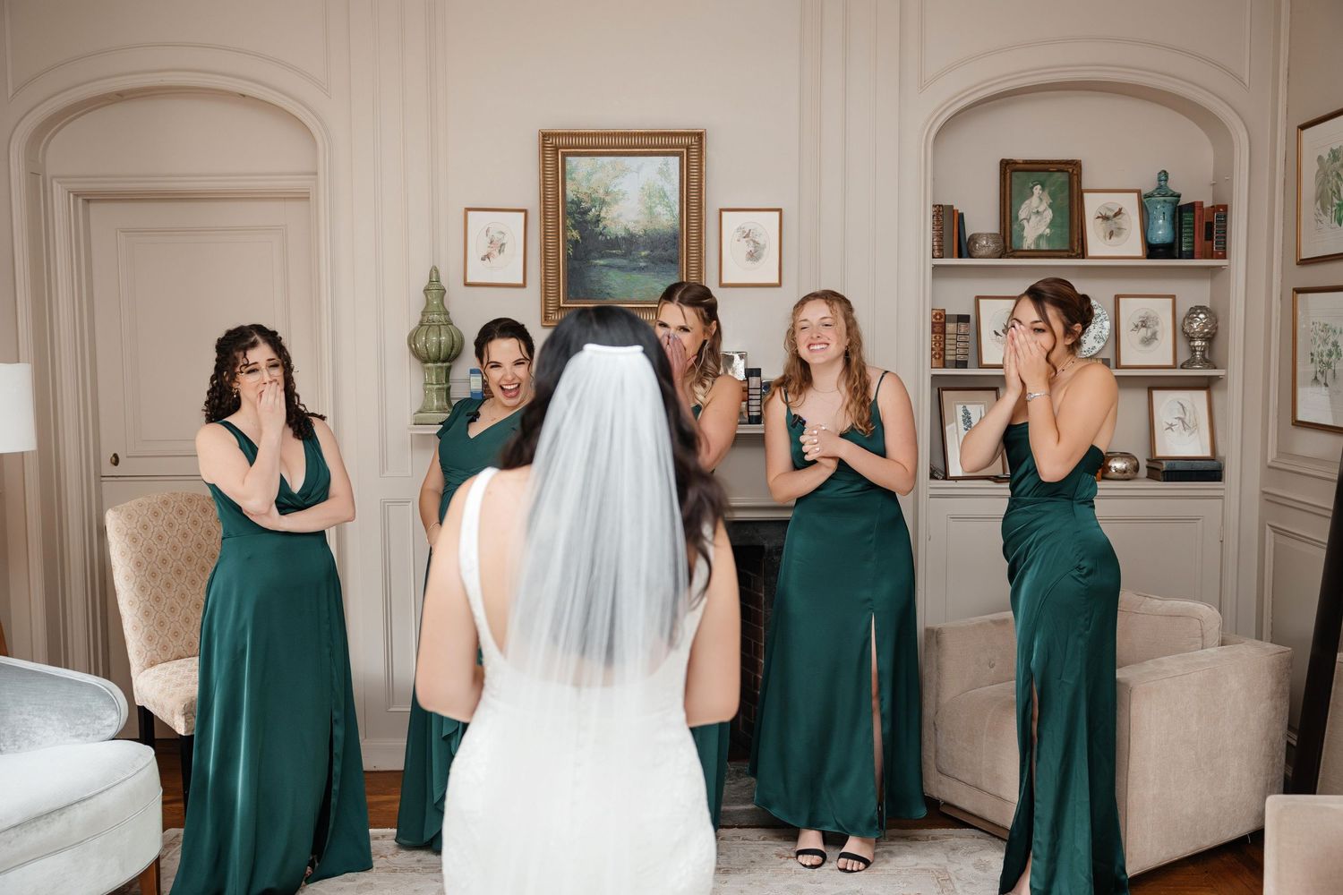 Bridesmaids reacting emotionally to bride’s reveal at Oxford Exchange Tampa FL, wedding photographer Grand Photo Karyna Oliinyk