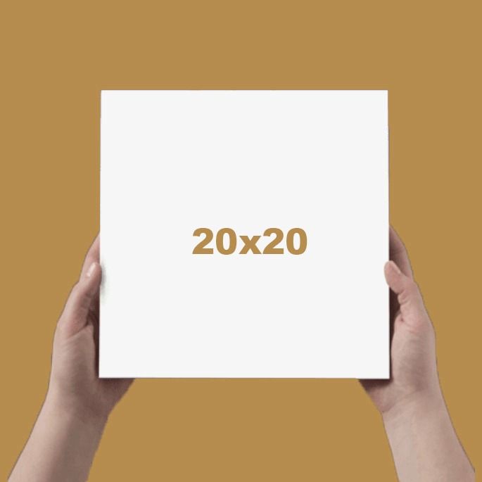 Two hands holding a white 20x20 square canvas against a warm golden brown background.