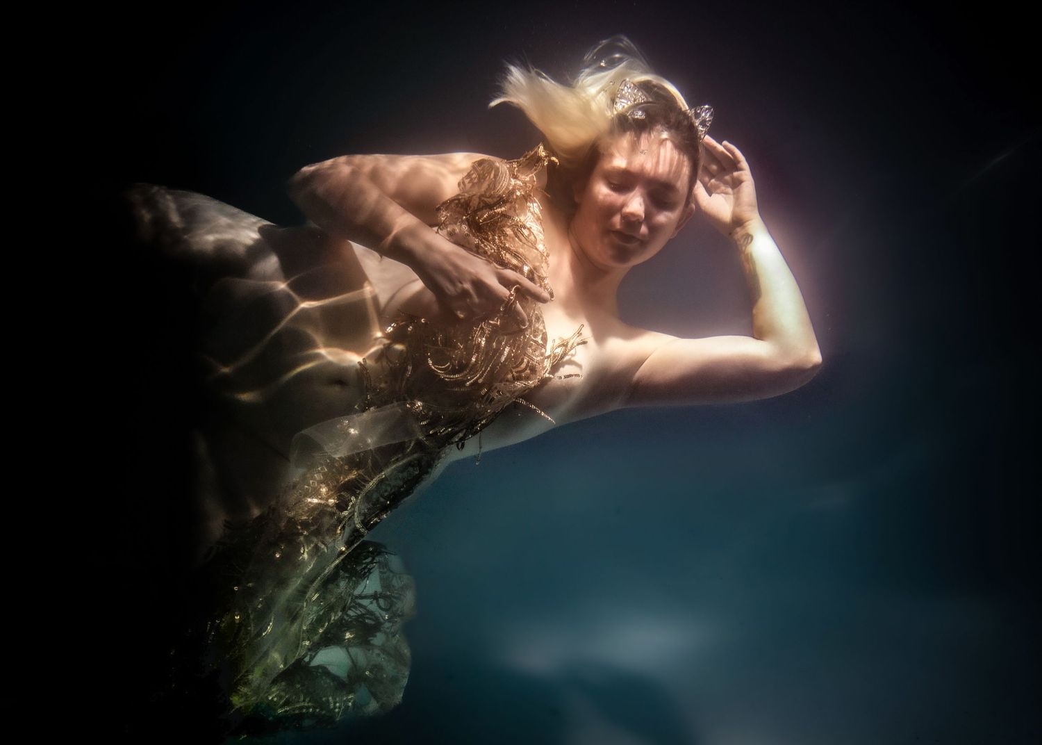 Creative conceptual portrait photography in Tucson Arizona with dramatic lighting and artistic storytelling
