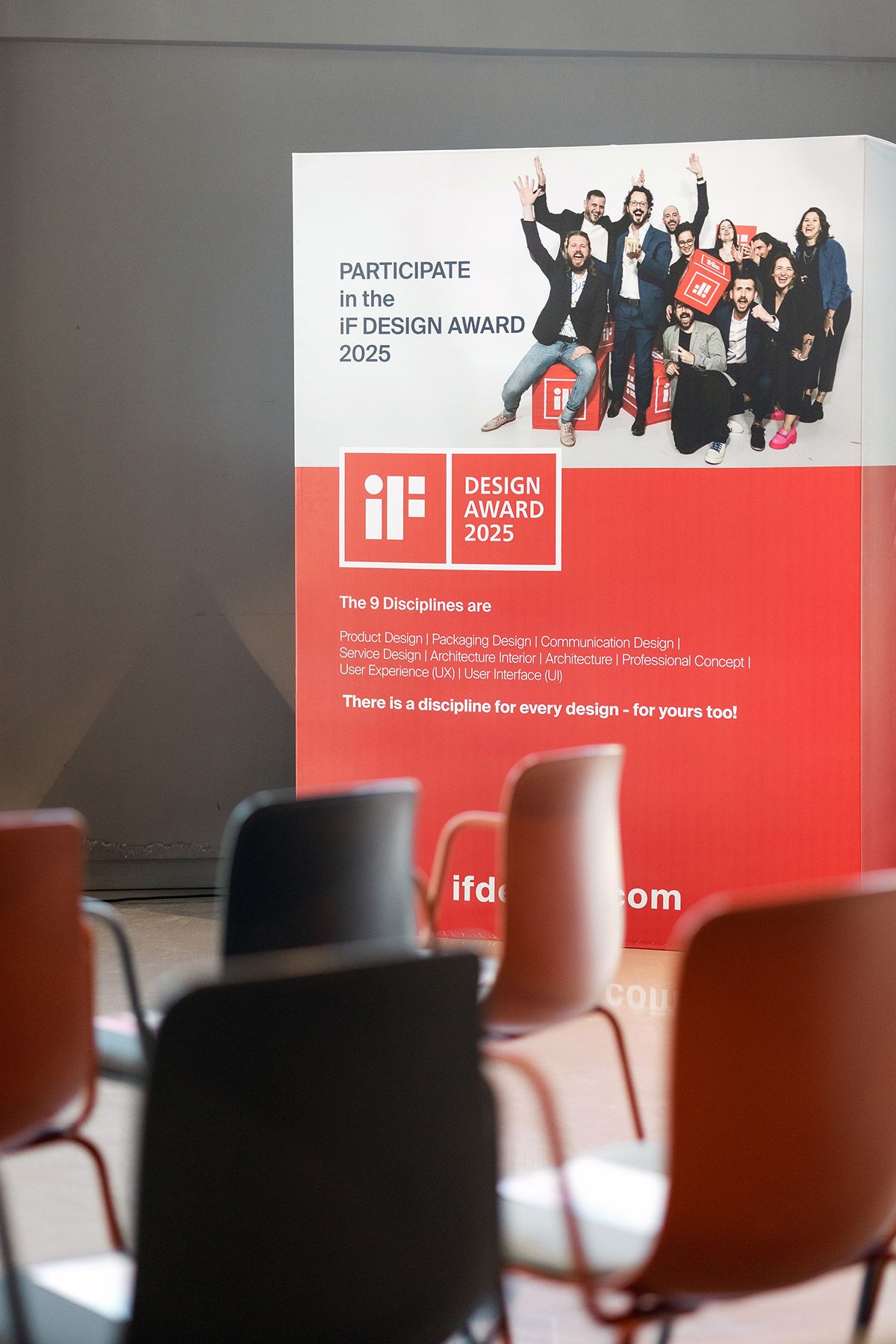 Branded signage and seating arrangement setting the stage for the iF Design Award corporate event in Istanbul.