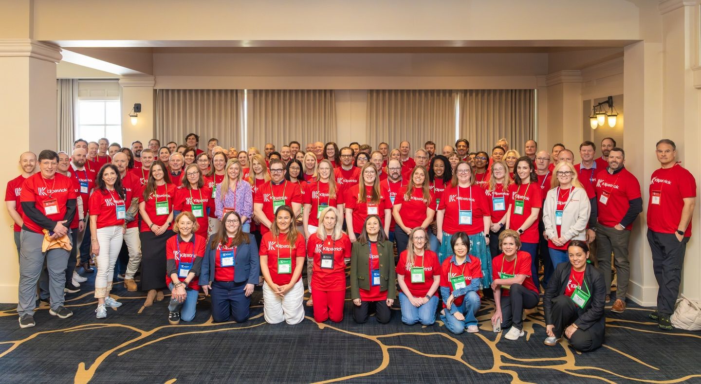Large group photo of lawyers at a non-profit event at the Omni hotel resort in Austin Texas.