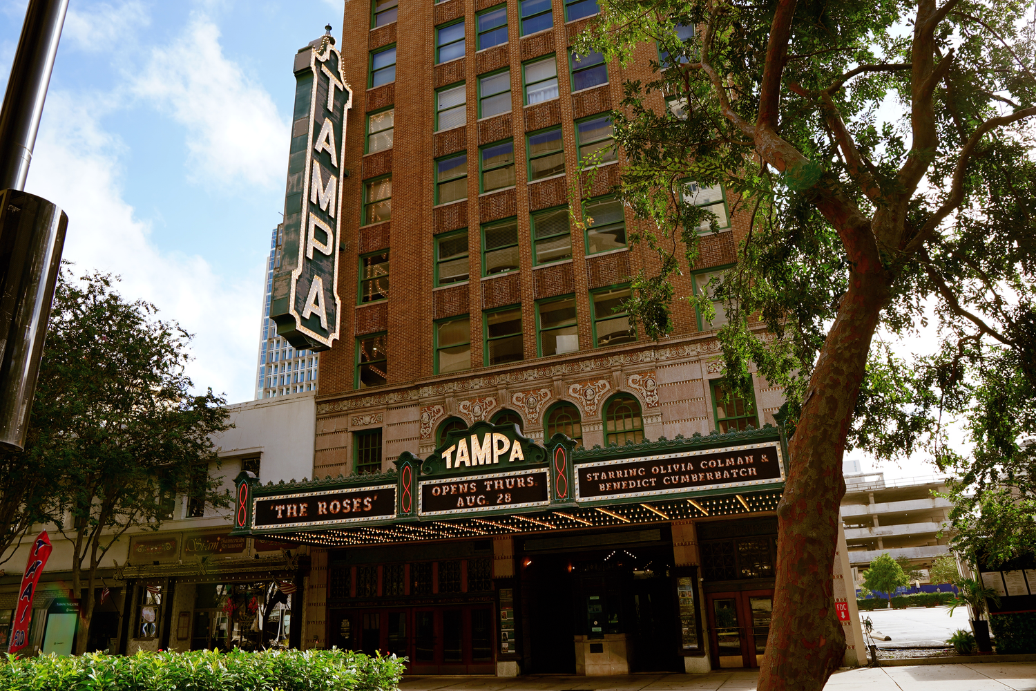 The historic Tampa Theatre marquee sign on a classic brick building in downtown Tampa, Florida.