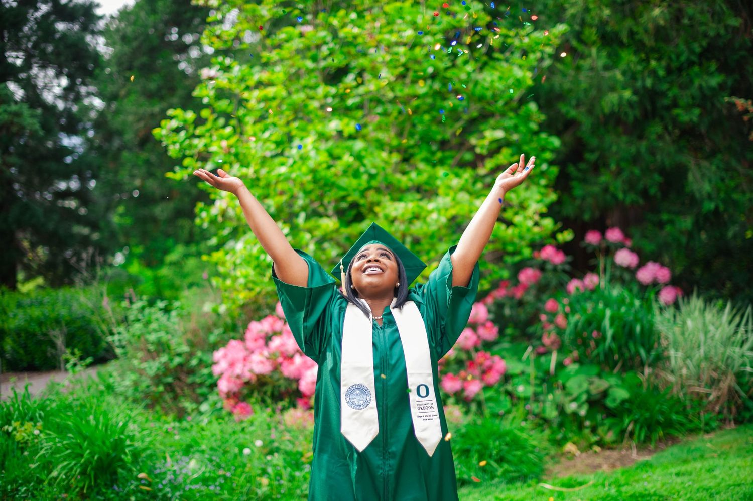 Senior graduation portrait — confetti celebration in garden, Bay Area senior portrait photographer