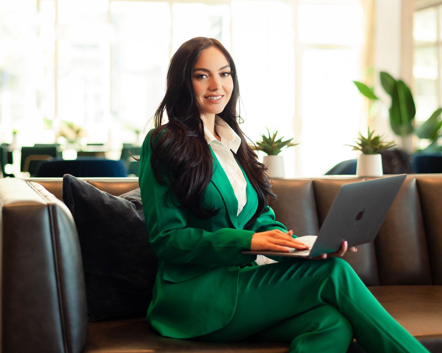 Senior portrait — young woman in elegant green outfit, professional senior photos Bay Area