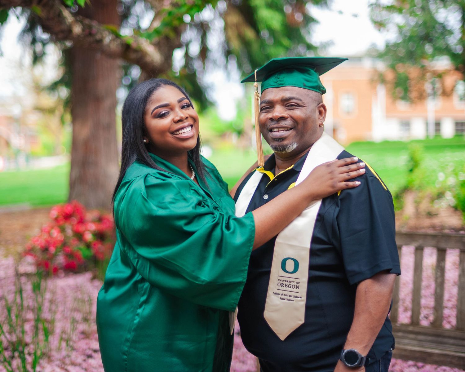 Senior graduation portrait — father and daughter cap swap, authentic family moment Bay Area